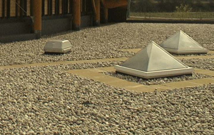 Ballasted roofs